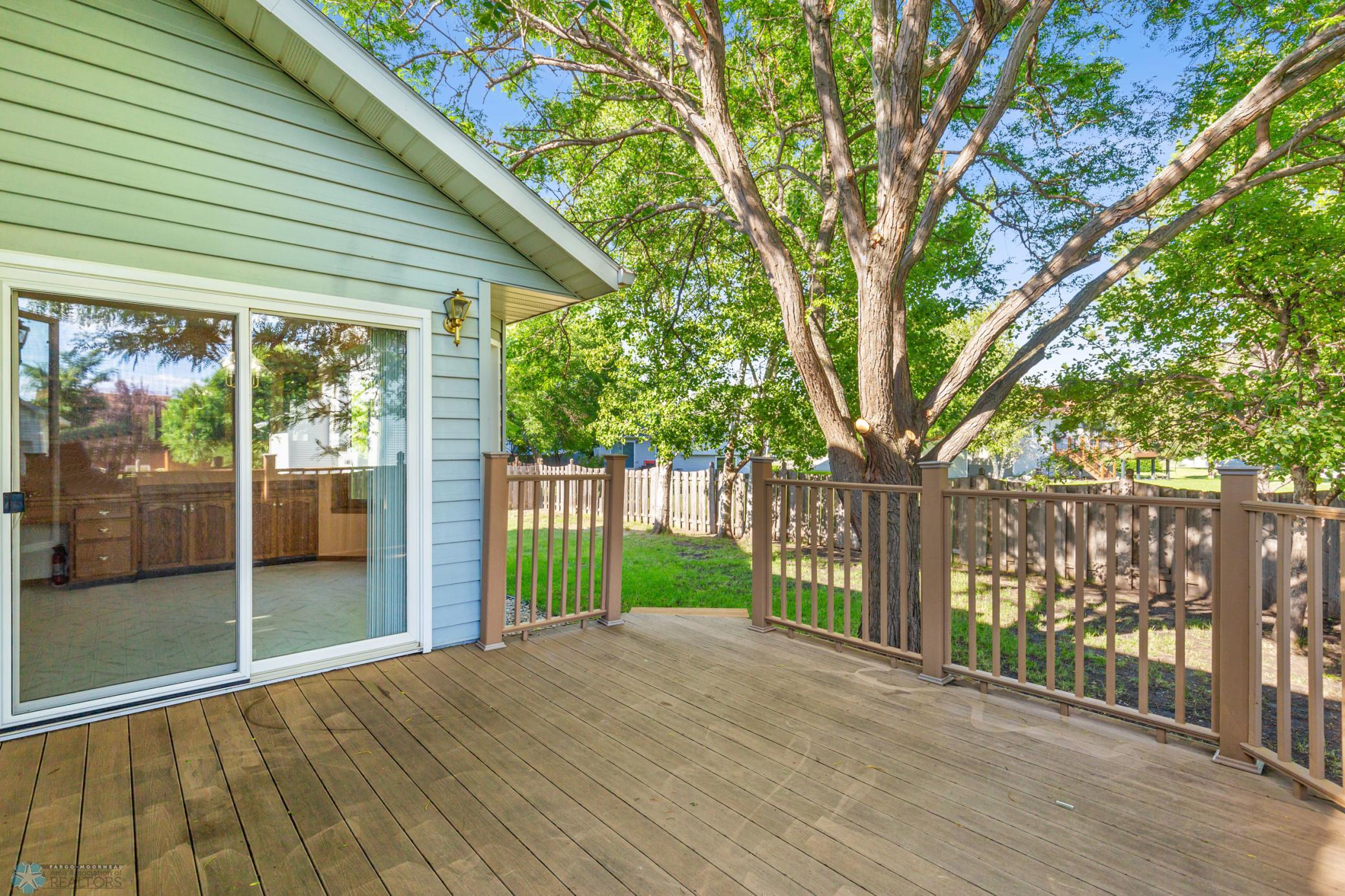 Maintenance Free Deck with Plenty of Shade from Umbrella Tree