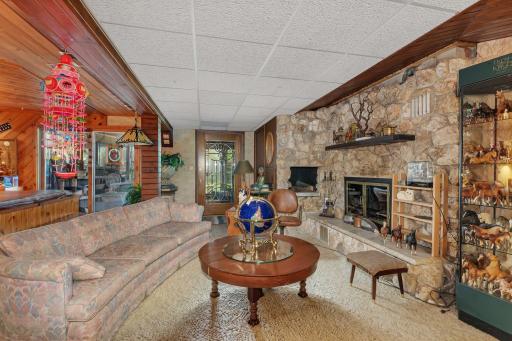 family room with firelplace in lower level and spa