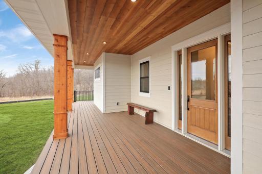 The welcoming front porch features maintenance free decking.