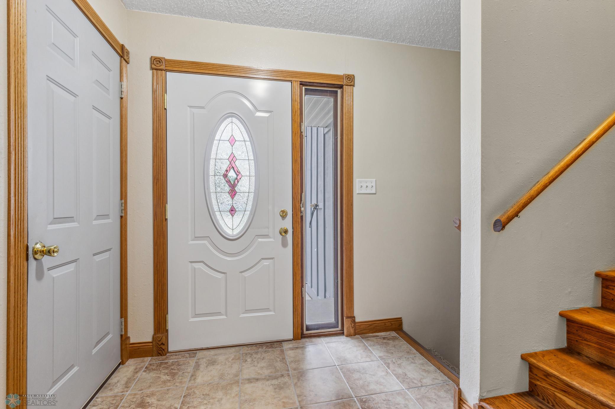 Entryway w/ new tile flooring