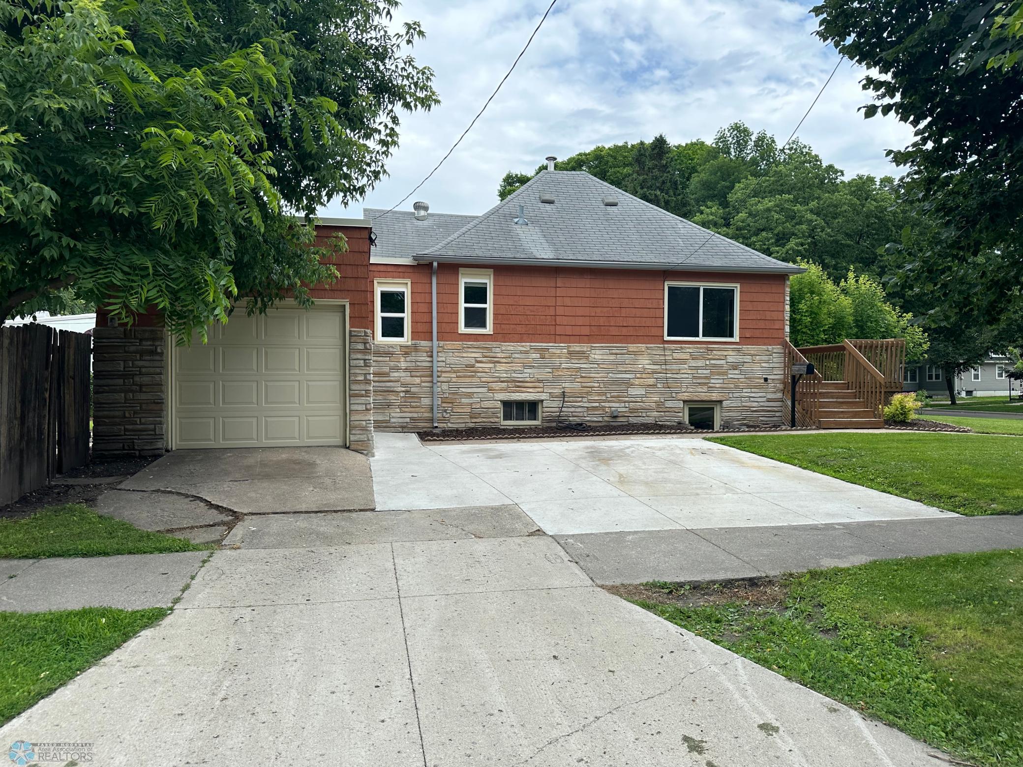 West Exterior/Parking Space