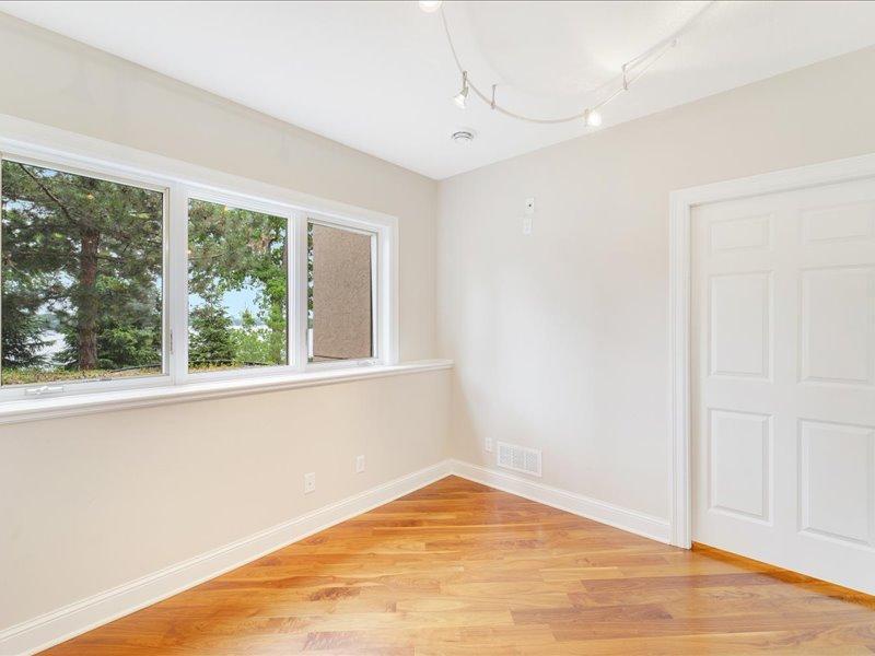 Workout room, with amazing lake views, large mirror wall, the perfect place to stay fit and inspired.