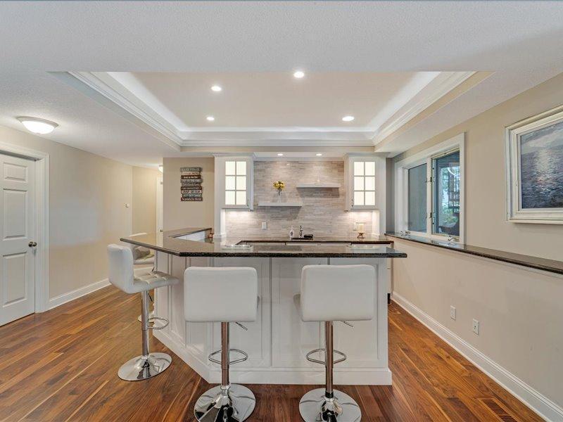 Lower level wet bar, wine fridge, cooler/fridge , dishwasher