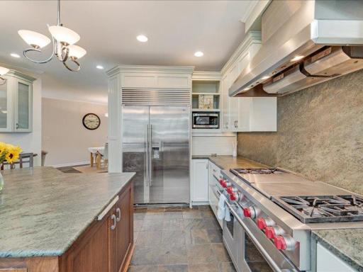 Ample countertop prep areas and generous stove.