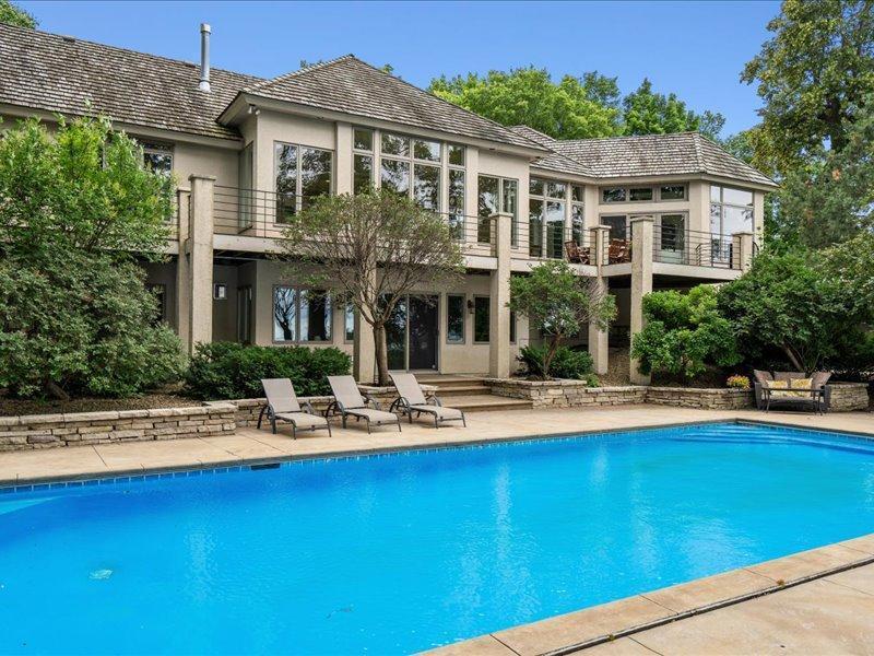 Walkout lower level to the pool and amazing lake views.
