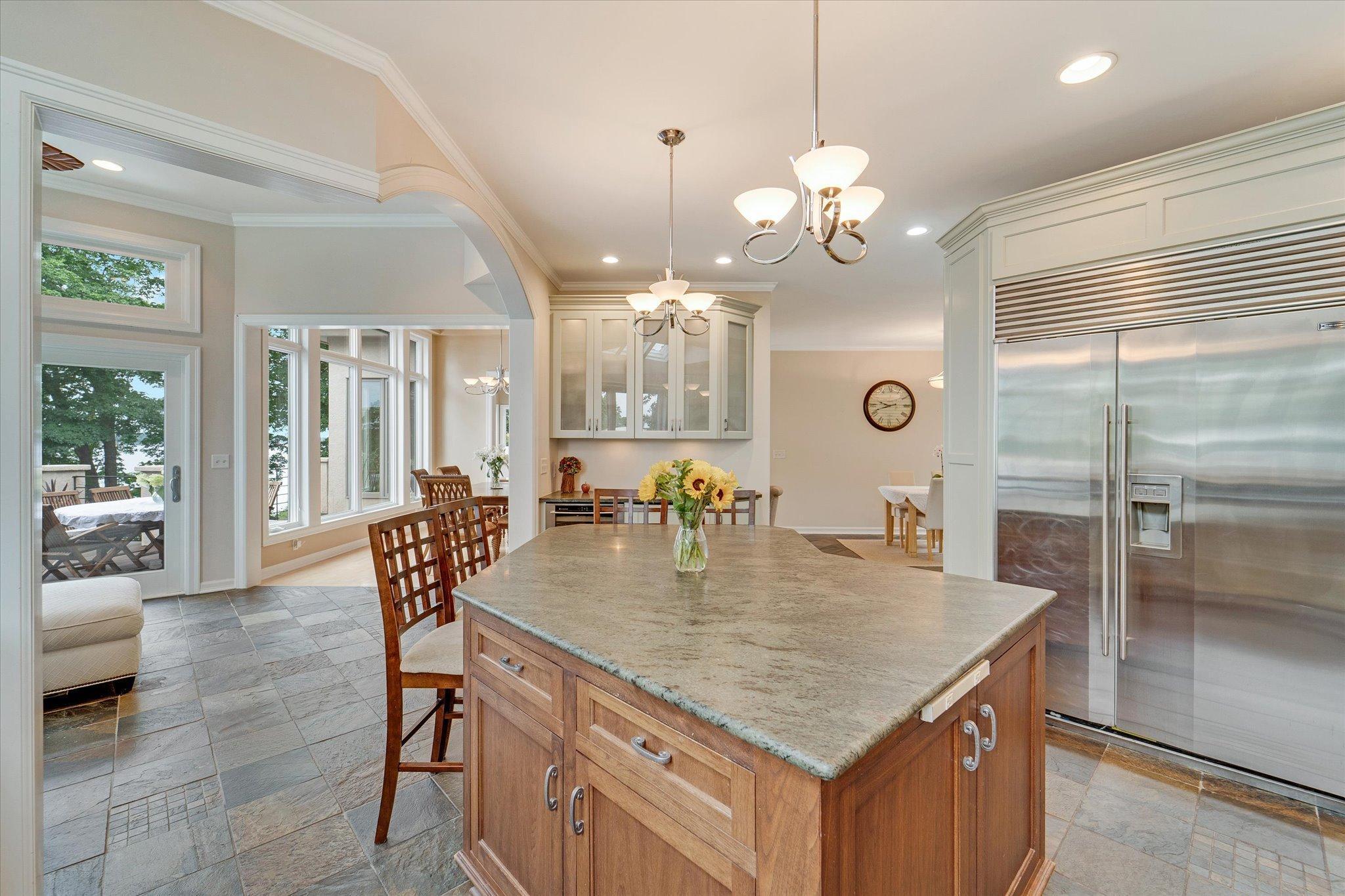 Massive island in this chefs dream kitchen.