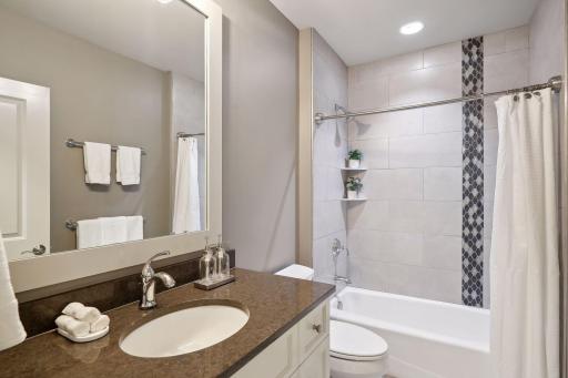 Convenient full bath sits between the two lower level bedrooms