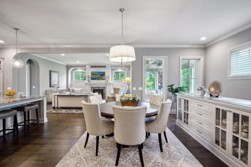 The gorgeous dining room has a lovely built-in china cabinet