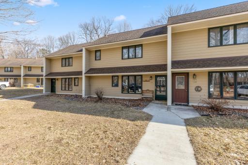 COMPLETELY UPDATED TOWNHOUSE W/DEDICATED DOCK & LAKE ACCESS TO BAY LAKE, ONE OF THE AREAS PREMIER LAKES! Great refined UpNorth look w/T & G ceilings, Custom Hickory Cabinets, Kitchen Bar Counter and separate Dining Area, LVP flooring, and much more!