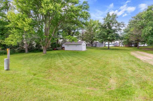 Welcome to this delightful 2-bedroom, 1-bathroom cabin, complete with a picturesque bunkhouse situated right at the water's edge.