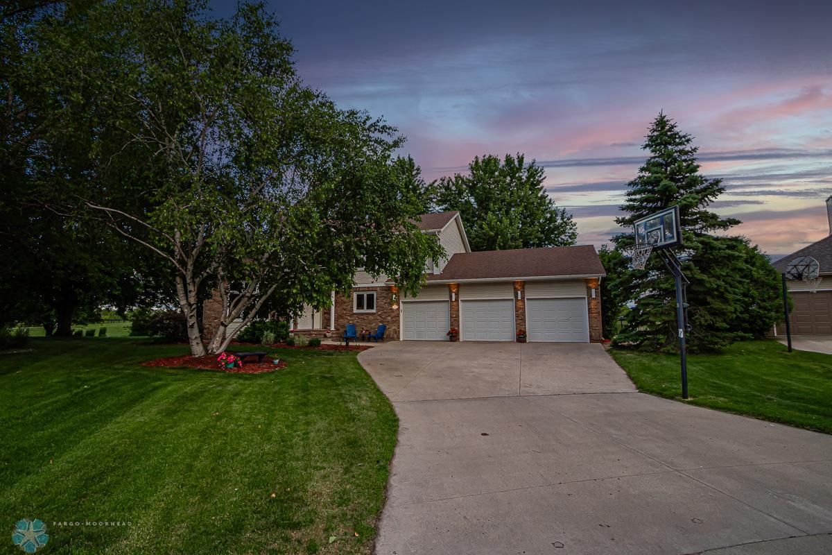 Evening view of the front of the home