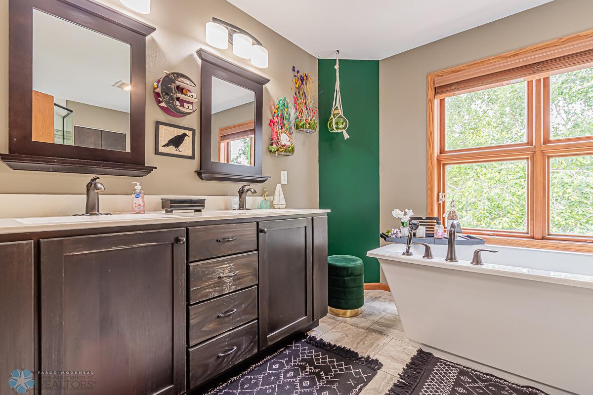 Master Bathroom with soaking tub and large walk in shower