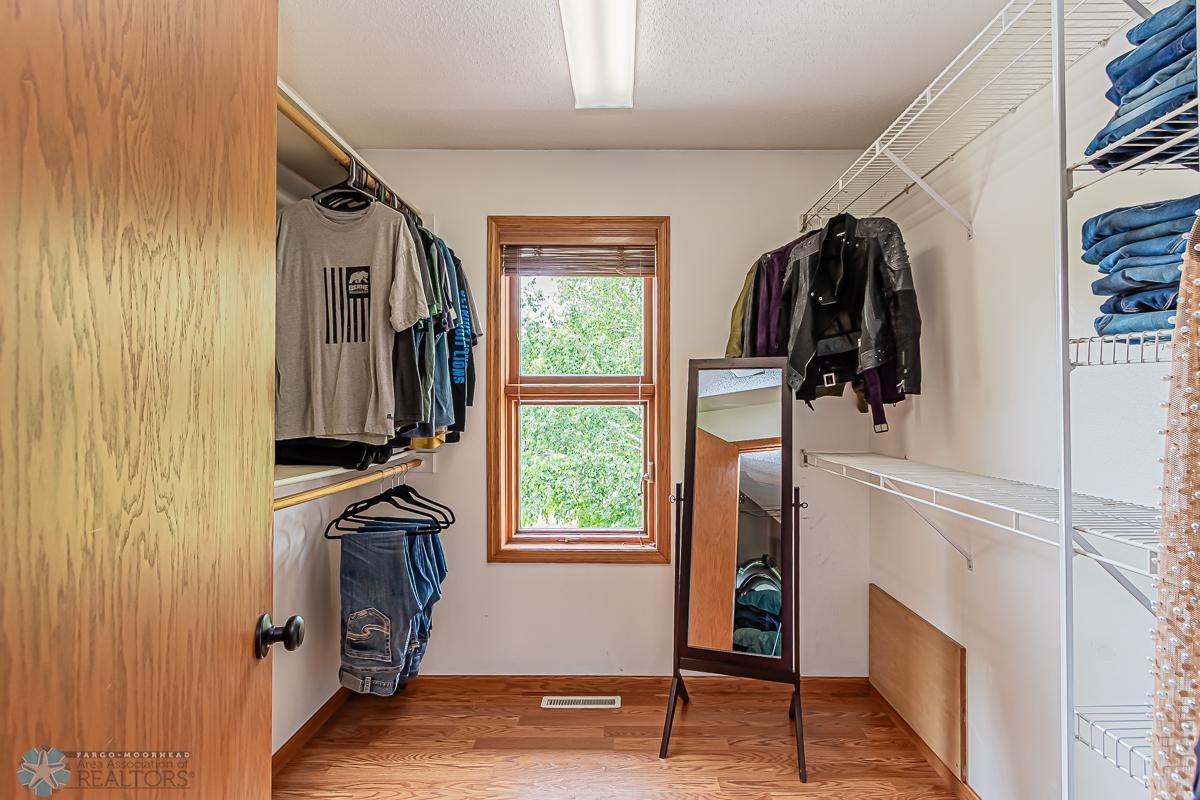 Master Bedroom walk in closet with Window