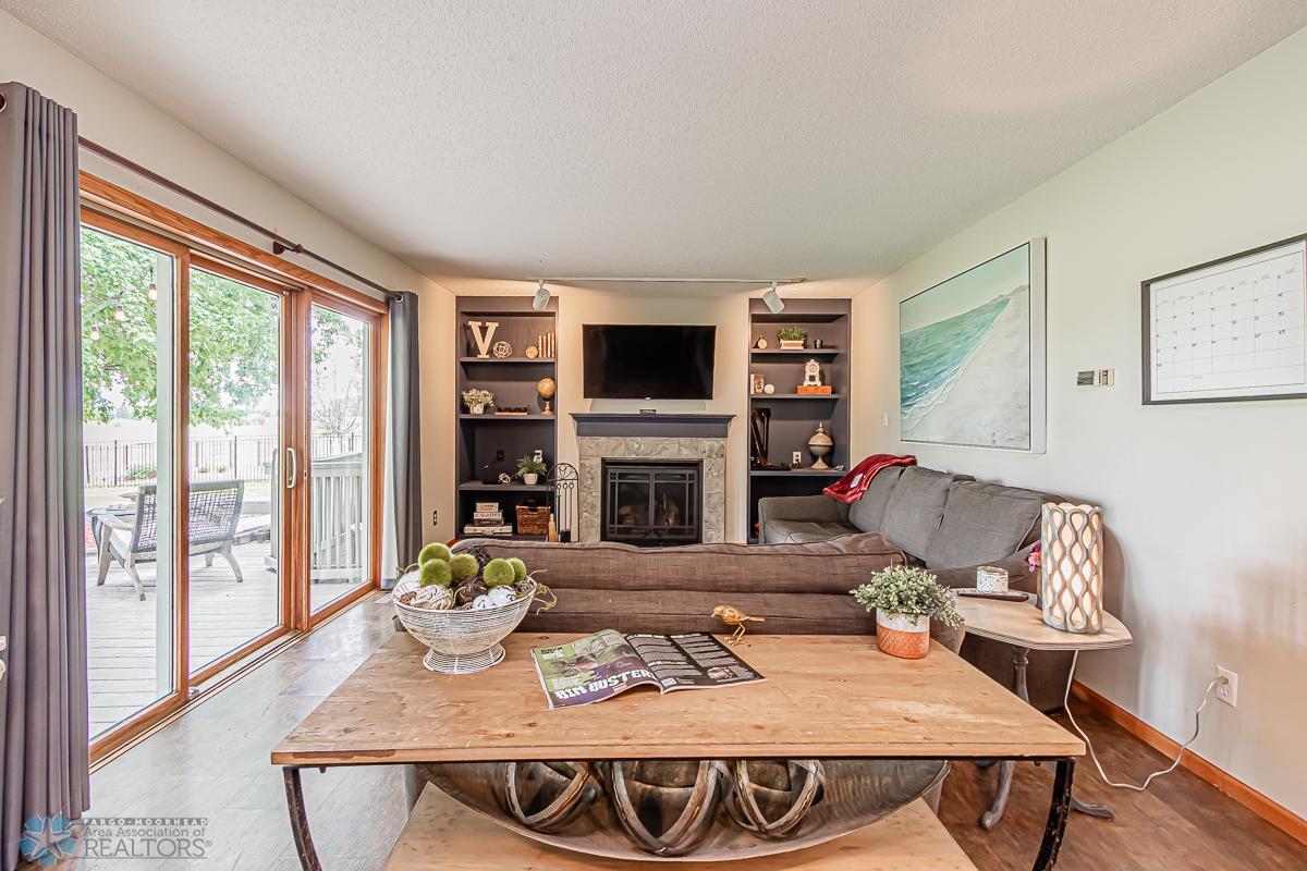 Family Room - Gas Fireplace - access to Deck