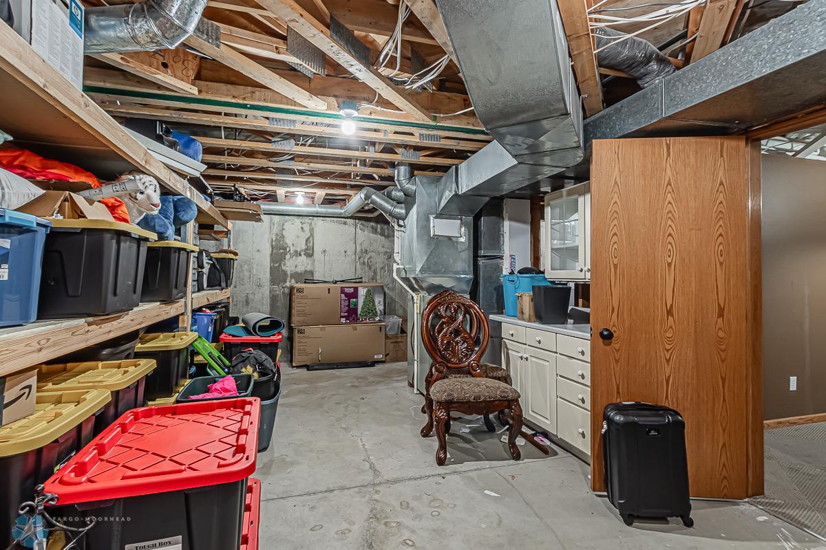 Lower level storage room with built in shelves