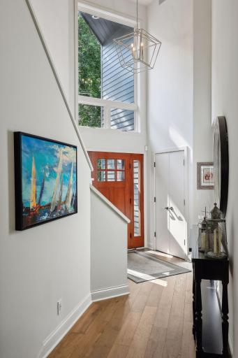 vaulted entrance with lots of natural light