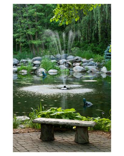 Sit on the bench and enjoy the peaceful sounds of the water feature