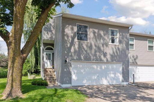 Dressed in a neutral gray vinyl exterior the END UNIT townhome is ready for you.