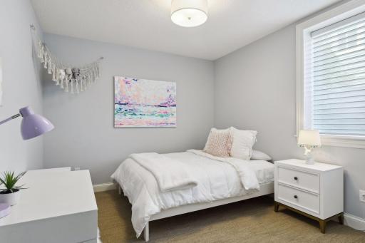 One of three bedrooms in the lower level.