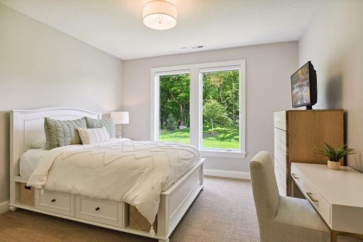 Three spacious bedrooms with adjacent three-quarter bathroom.