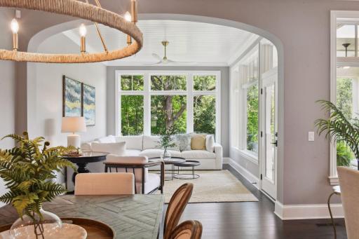 Floor-to-ceiling windows allow for sun-filled rooms and beautiful views of private backyard.