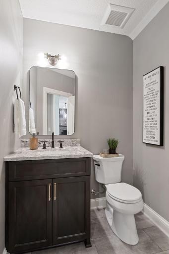 The lower level also has a half bath for guests.