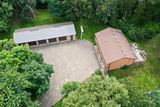 Welcome Home to this 2.6 wood acres and 5 car shop that even comes with a house!