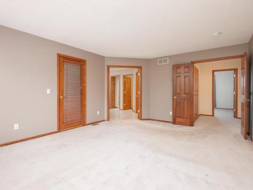 French doors open into spacious Primary Suite with private Full Bath.