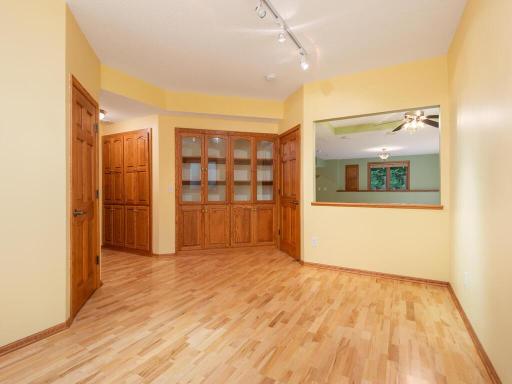 Lower level Office/Flex Room has built-in display cabinet and could be finished as additional Bedroom.
