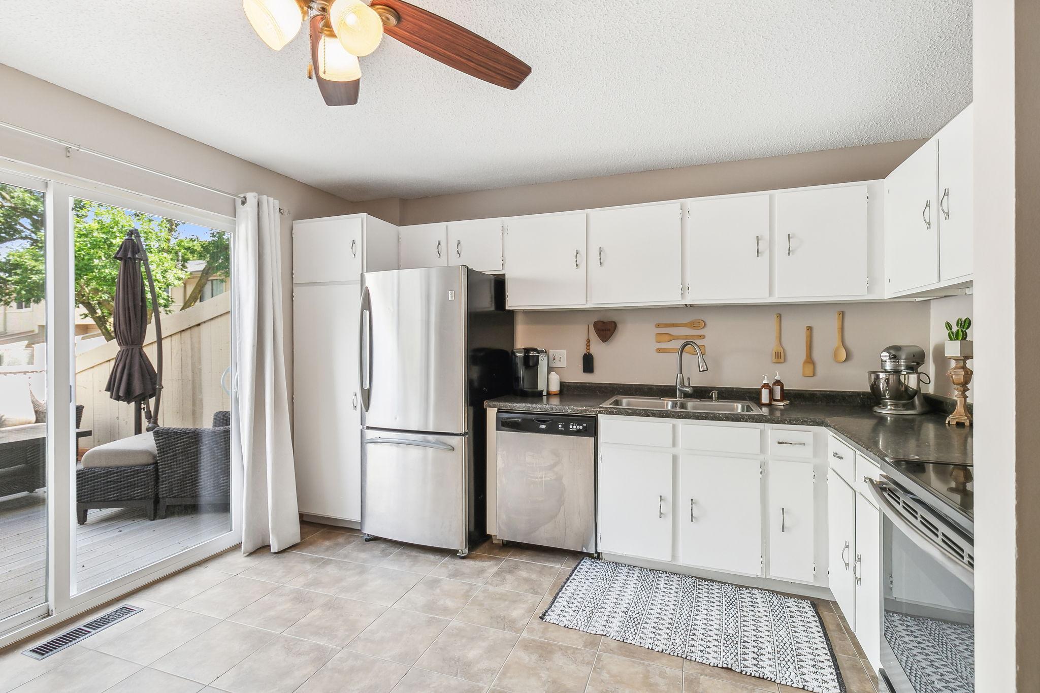 Kitchen with stainless steel appliances.
