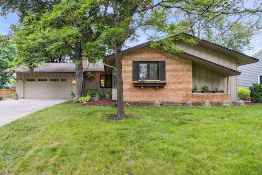 Extremely well kept home on a wooded lot, set back off street, amazing landscaping, 1 block from Northwood Park.