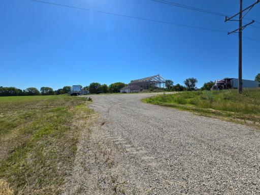 Welcome to your newest adventure! This 2.5 acres is ready for you to build your dream shouse! Driveway, septic, electric are all completed. Shouse is started; shed has 16' sidewalls, 14' opening for overhead doors.