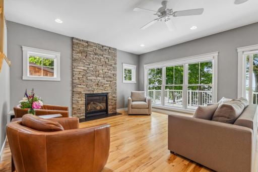 Gas fireplace in the living room over looking the lake