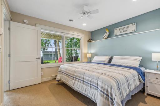 Lower level bedroom with views of the lake