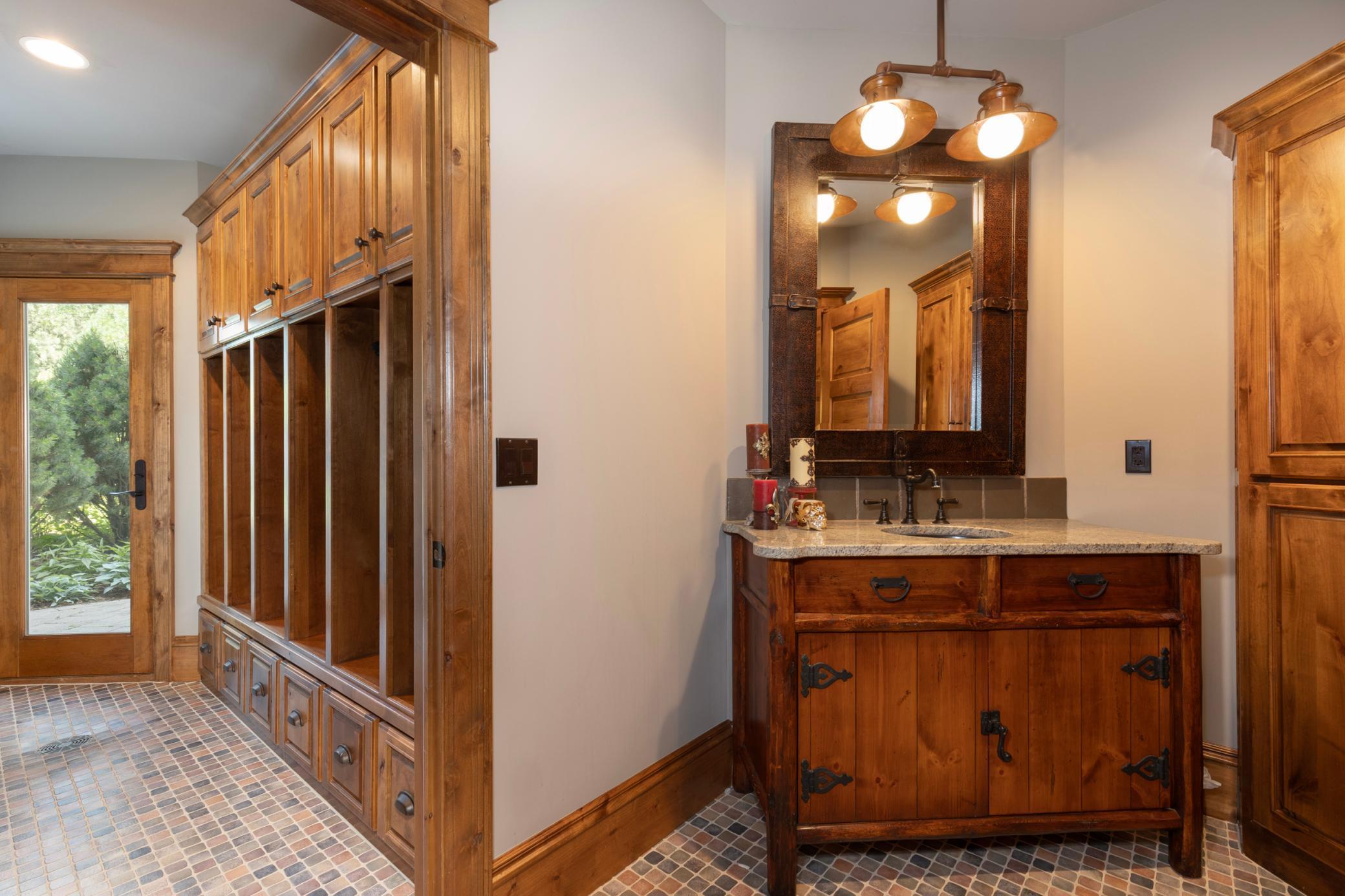 Lower Level Cubbies and Bath for Pool - walkout to Pool Area