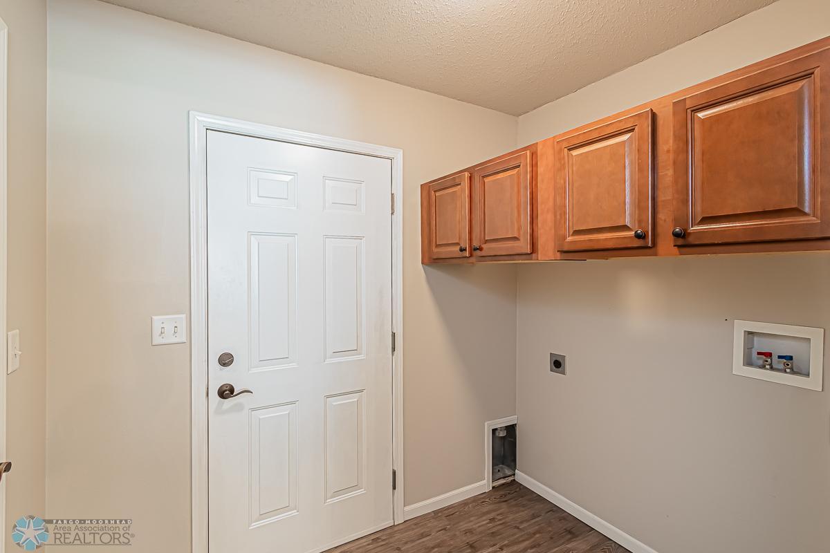 Laundry room with access to the garage