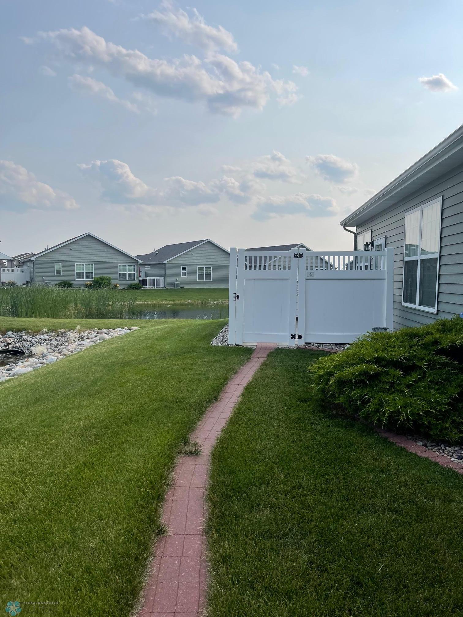 East side of home - fenced patio area