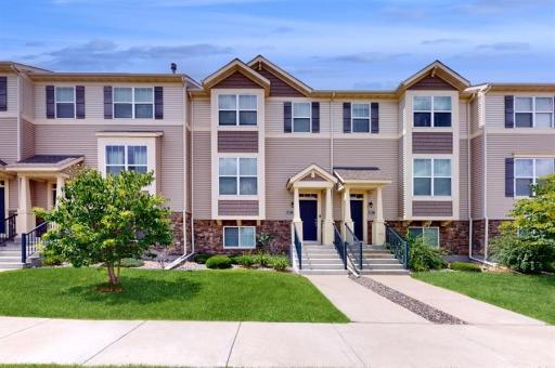 Nice curb appeal front exterior with morning sun on the edge of the development. Partial pond views from the Kitchen and 2 of the 3 Bedrooms on the upper level.