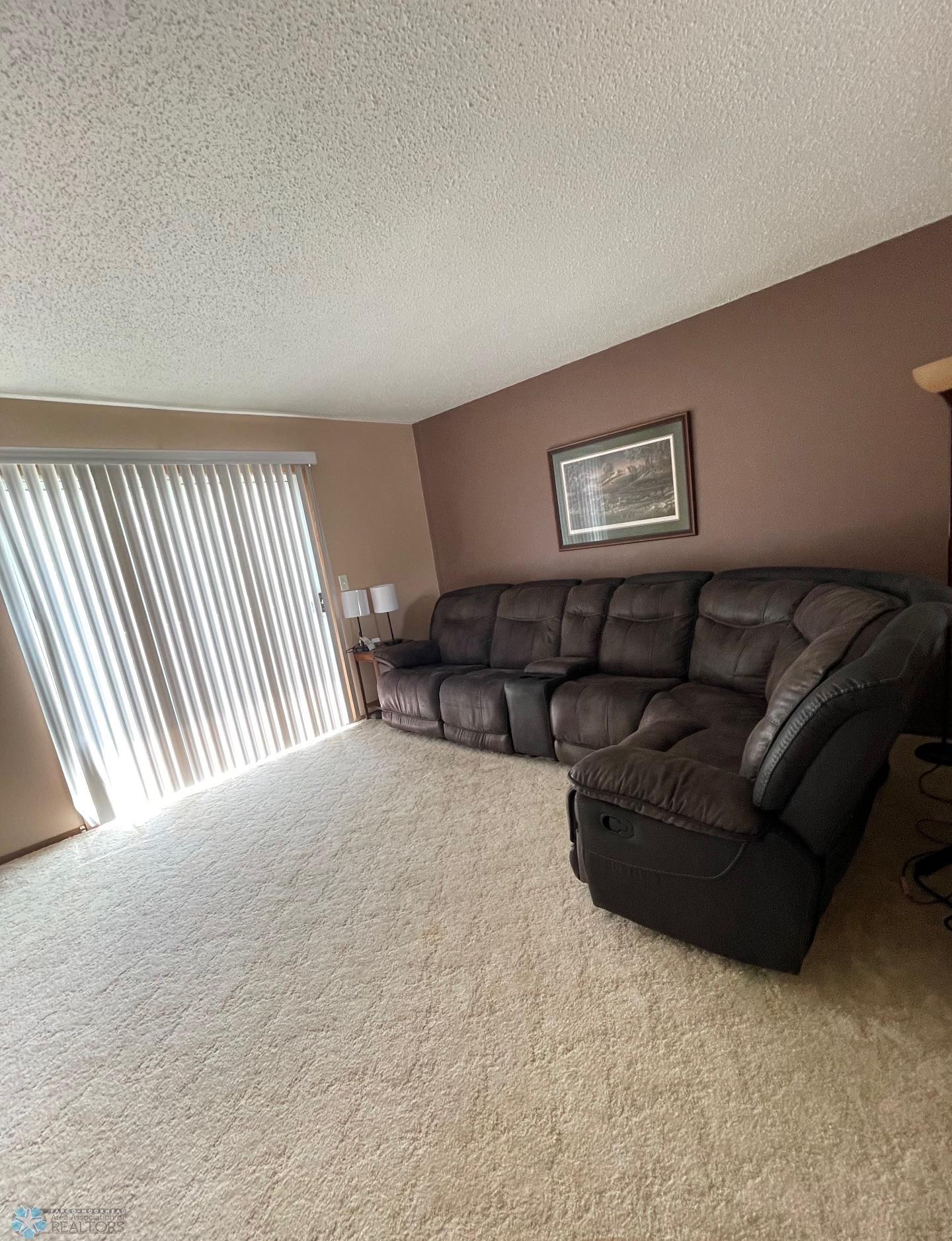 Living room w/ patio door