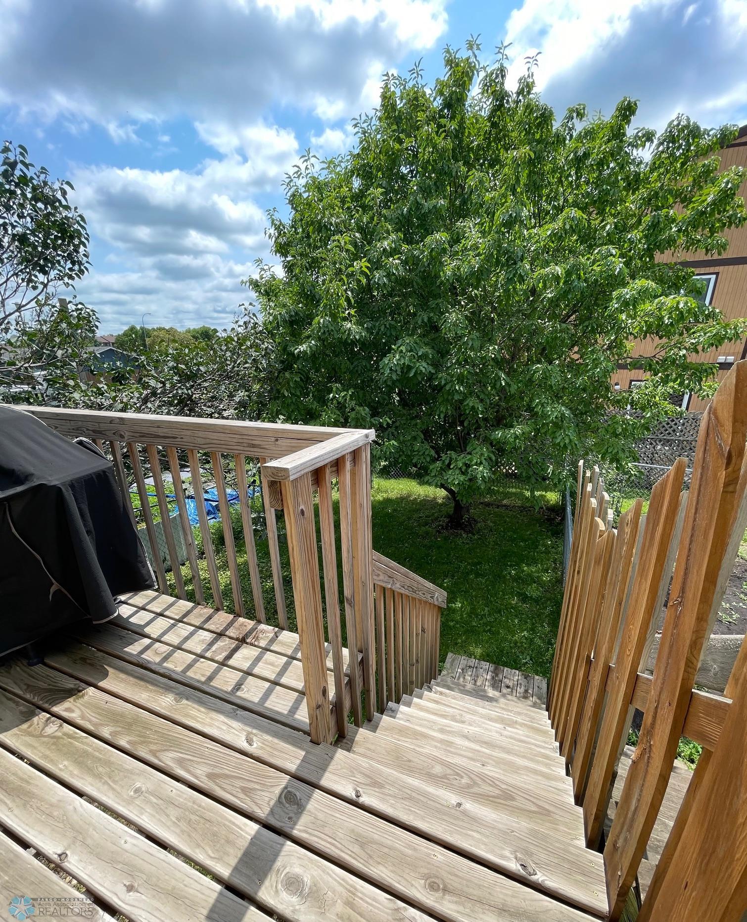 Deck off Living Room to fenced back yard