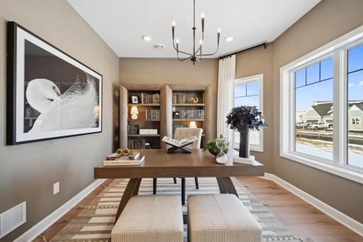 Inspiration: Front den is perfect for home office. Photo of model to show furnished