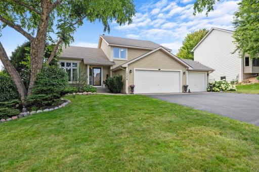 Fieldstone edging and the triple Transom window add to the appeal of the front elevation