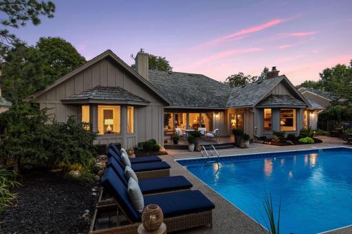 Relaxing lounge areas surround the swimming pool