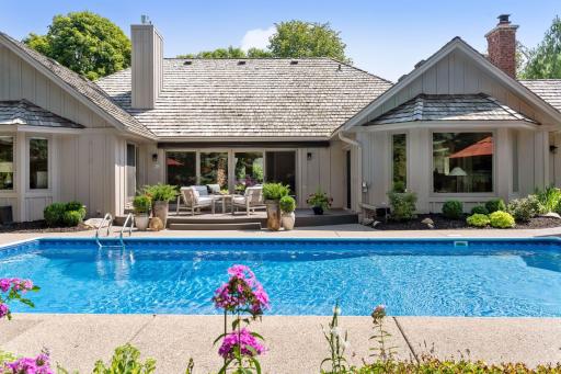 Deck and pool area is easily accessible from the primary bedroom, living room, main level family room and the sun room