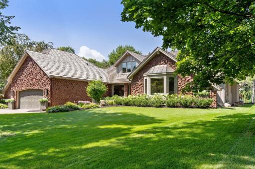 Beautiful front yard features incredible curb appeal