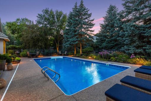 Updated exterior lighting sets the mood for an evening swim