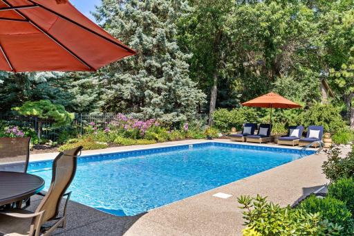 Professional landscaping designed to create a private oasis to soak up the sun