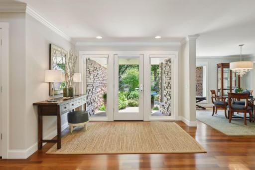 Wide open entry foyer sets the tone for the elegance and grandeur that flows throughout this luxurious home