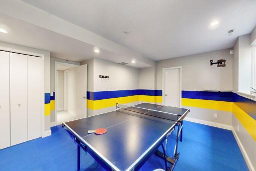 The versatile game/exercise room was thoughtfully designed to serve as a potential 6th bedroom, adding flexibility to the homeâs layout