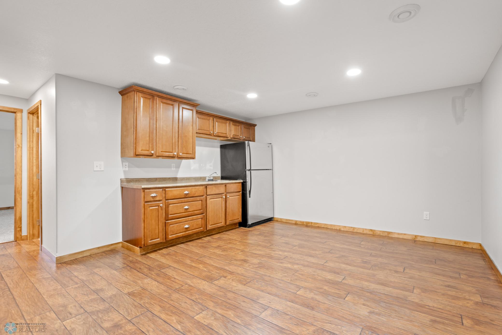 Wet bar room with room for game tables
